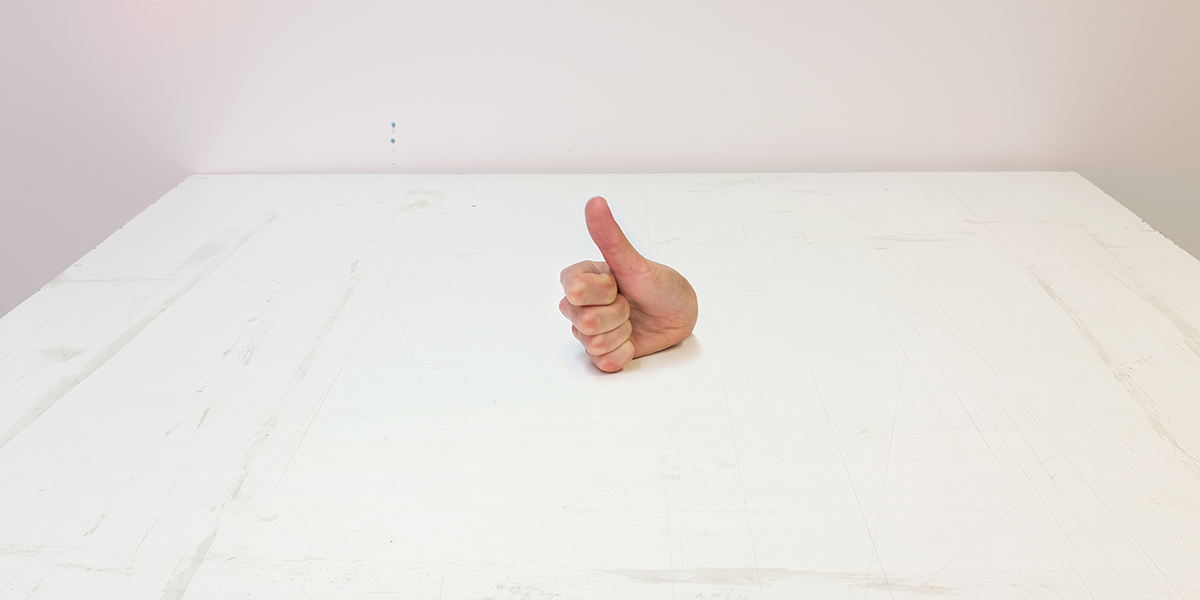 Detail of Sean Healy's print showing a thumbs up
