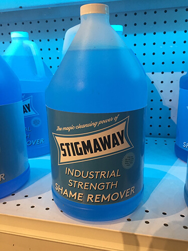 Photo of bottle of Stigmaway Industrial Strength Shame Remover from Dorian Lynde's installation titled Buying Power