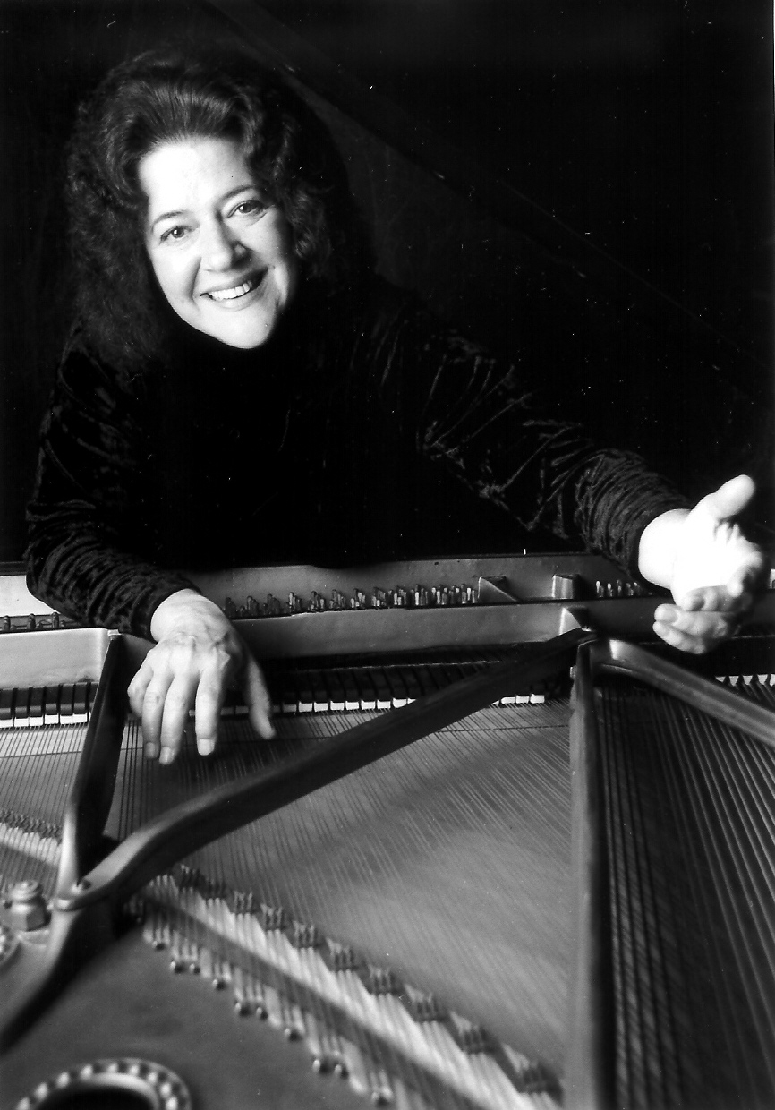 Photo of Victoria Neve and a piano