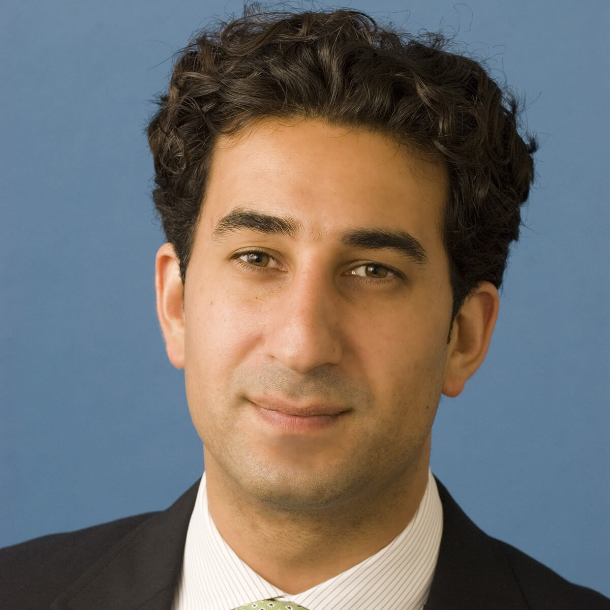 Photo of Karim Sadjadpour wearing a suit