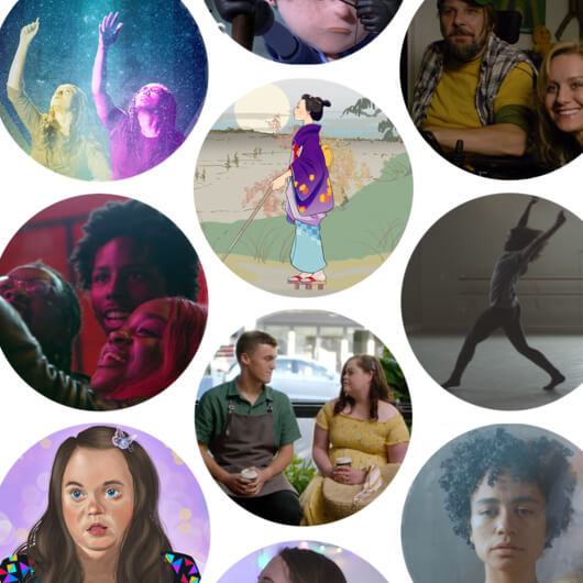 Multiple circles of various film stills, including an illustration of a white woman with Down syndrome wearing a multicolor shirt, a drawing of a blind Japanese woman and a Black woman dancing