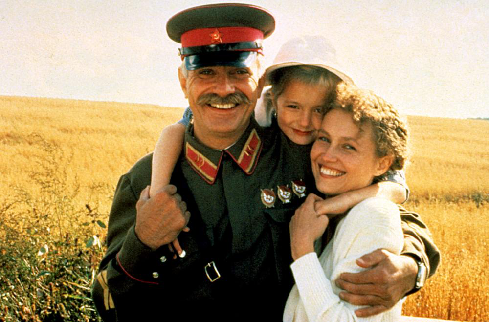 Photo of soldier, child and woman hugging