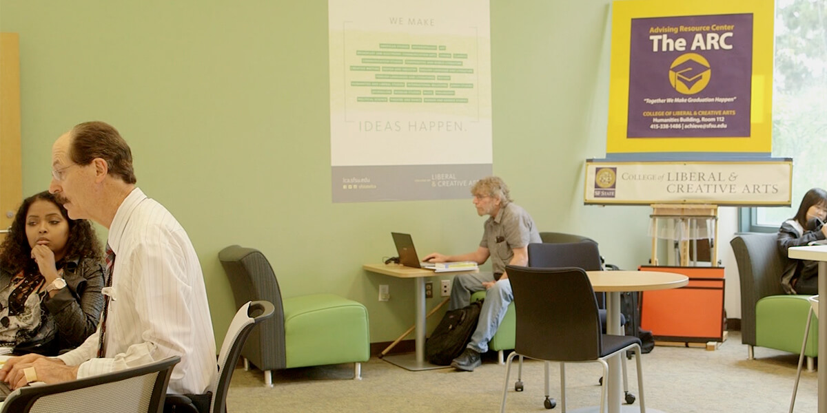 Photo of students working in Advising Resource Center