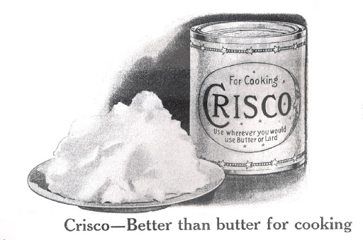 Image of old advertisement with Crisco can and product with slogan Crisco -- better than butter for cooking