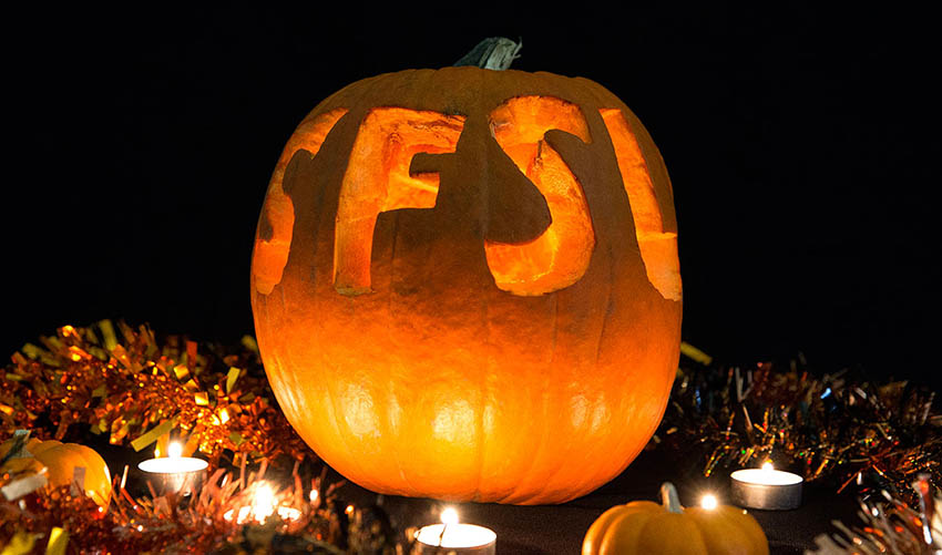 Photo of Jack o' Lantern with SFSU carved in it