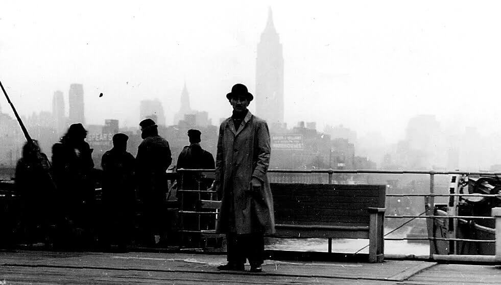Black and white photo of Alexander Karim on Ellis Island in 1946