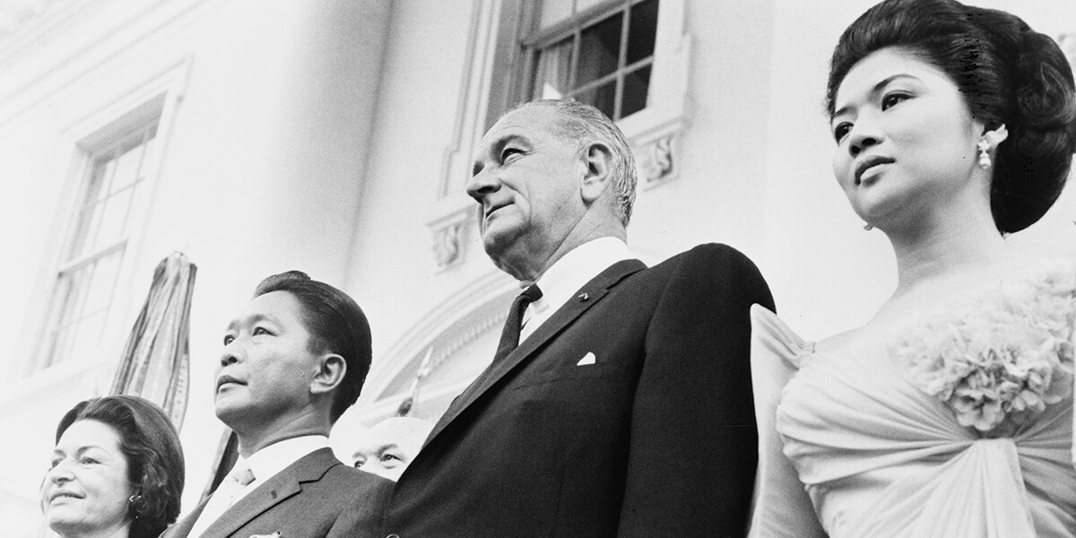 Black and white photo of President and Mrs. Lyndon Johnson and President and Mrs. Ferdinand Marcos at the White House