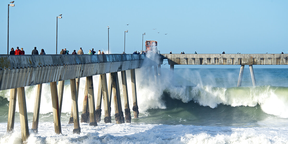 Photo of waves crashing into Pacifica Pier