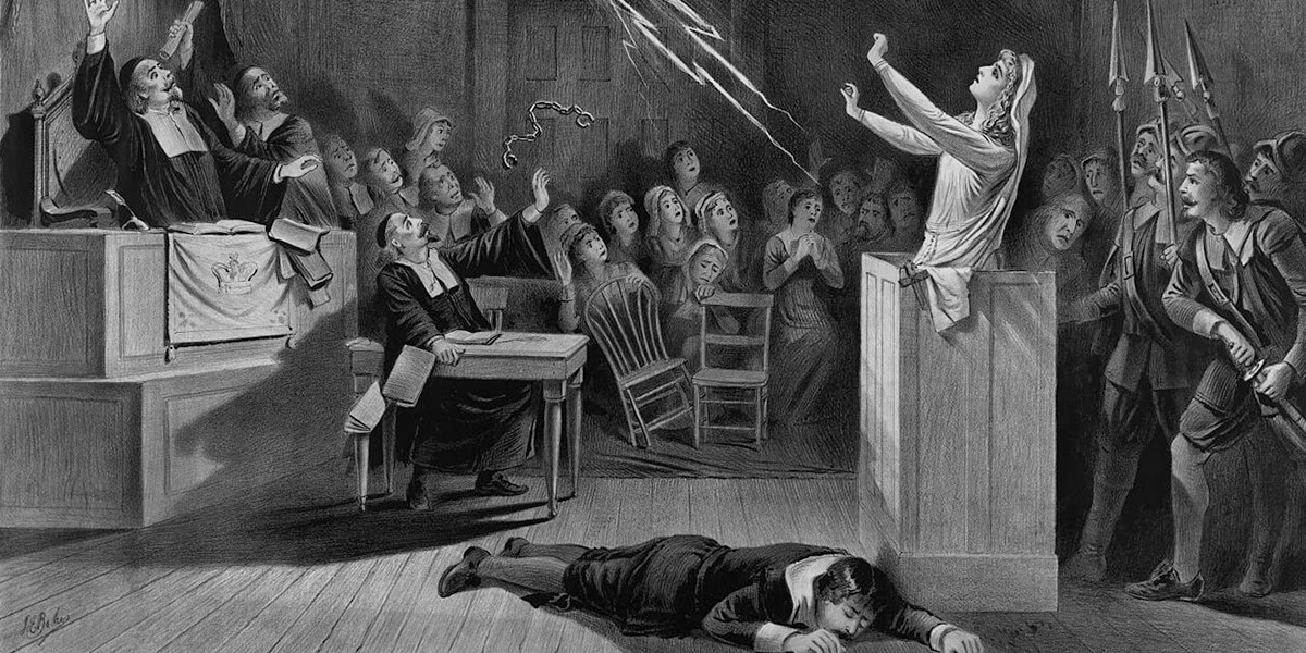Black and white lithograph of man laying on ground during Salem Witch Trials