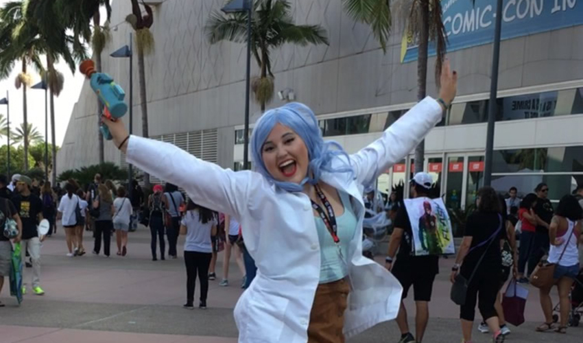 Photo of Azul-Sanchez Macias jumping in air dressed as Rick from Rick and Morty