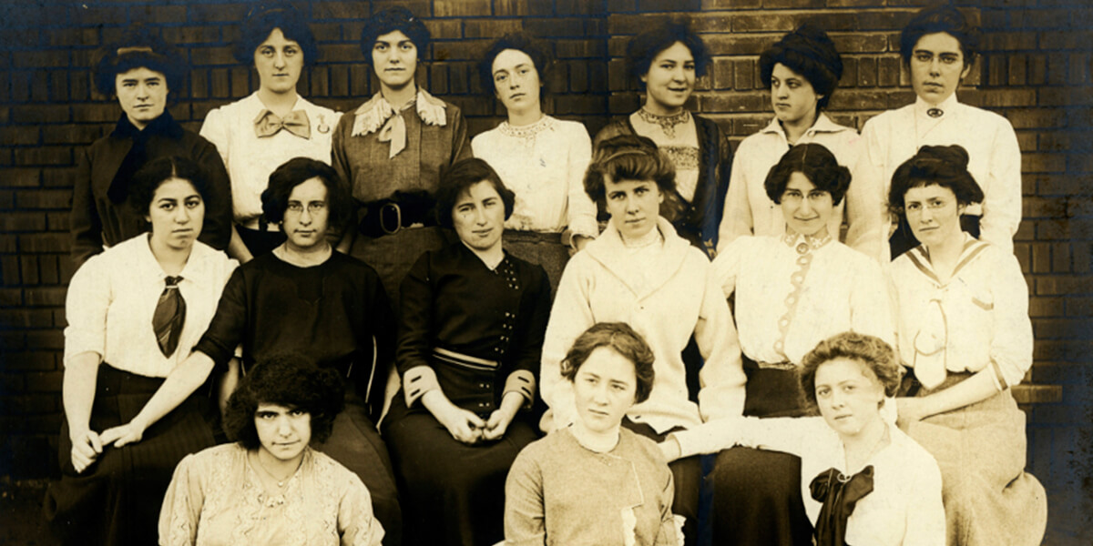Sepia-tone photo from 1916 of 16 female SF State students seated in three rows