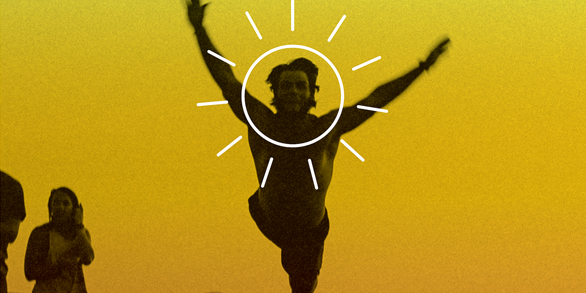 Photo of man leaping in air with illustration of sun around his head