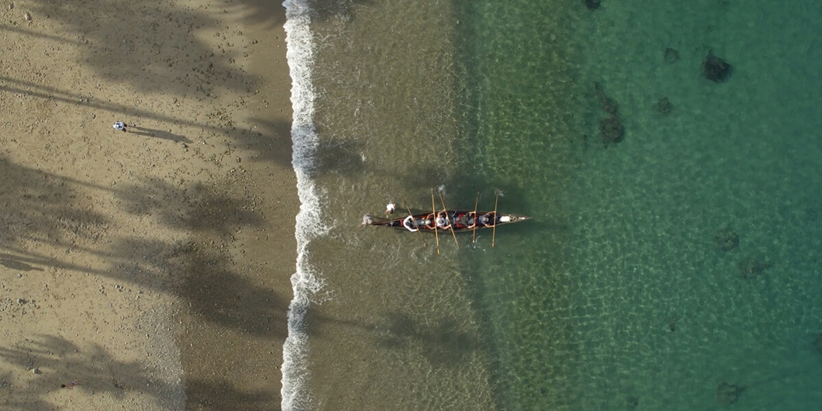 Photo of the launch of a Ti’at, a traditional Tongva canoe