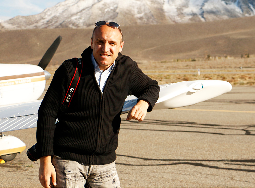 Photo of Jassen Todorov standing next to his plane