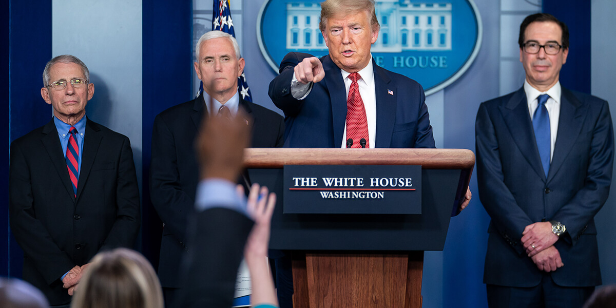 Photo of President Trump calling on a reporter at White House briefing on March 25
