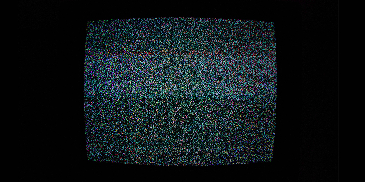 Image of television screen displaying white noise