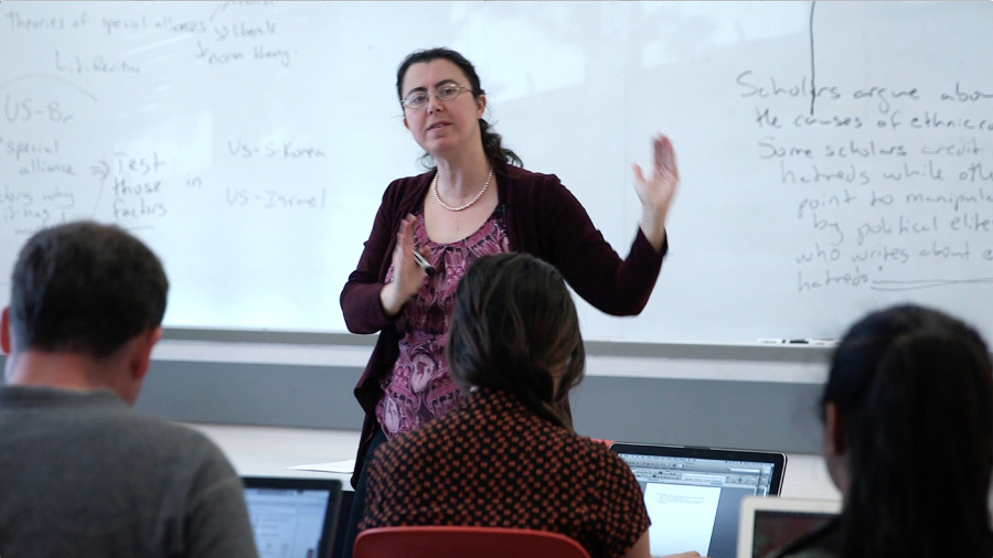 Photo of Burcu Akan Ellis giving a class lecture