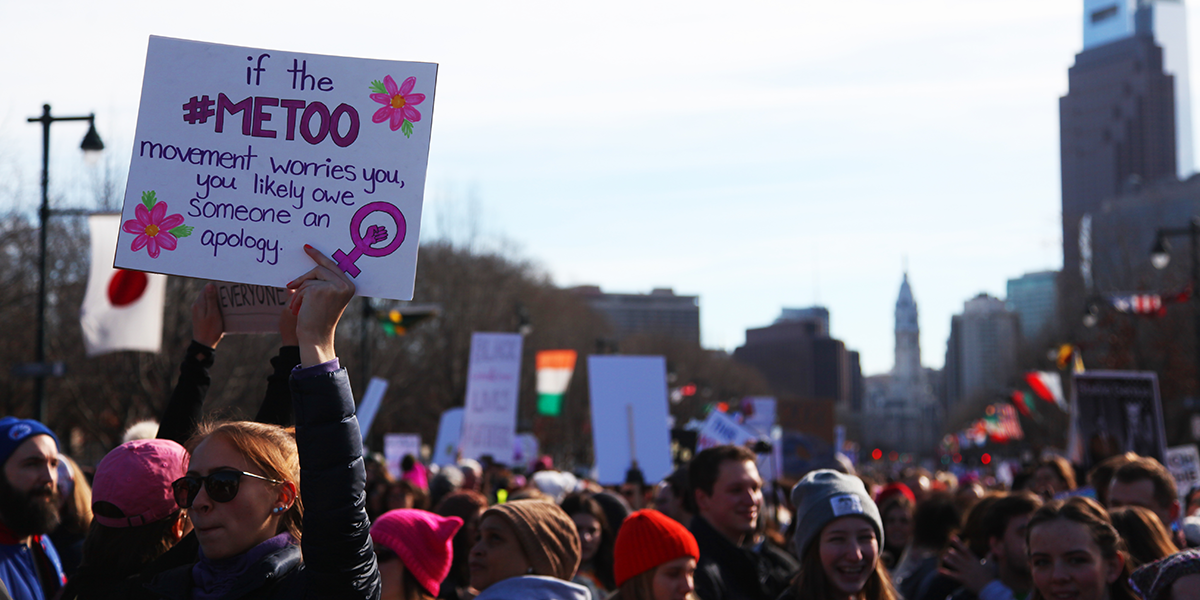 Photo of Women's March featuring sign addressing #MeToo movement