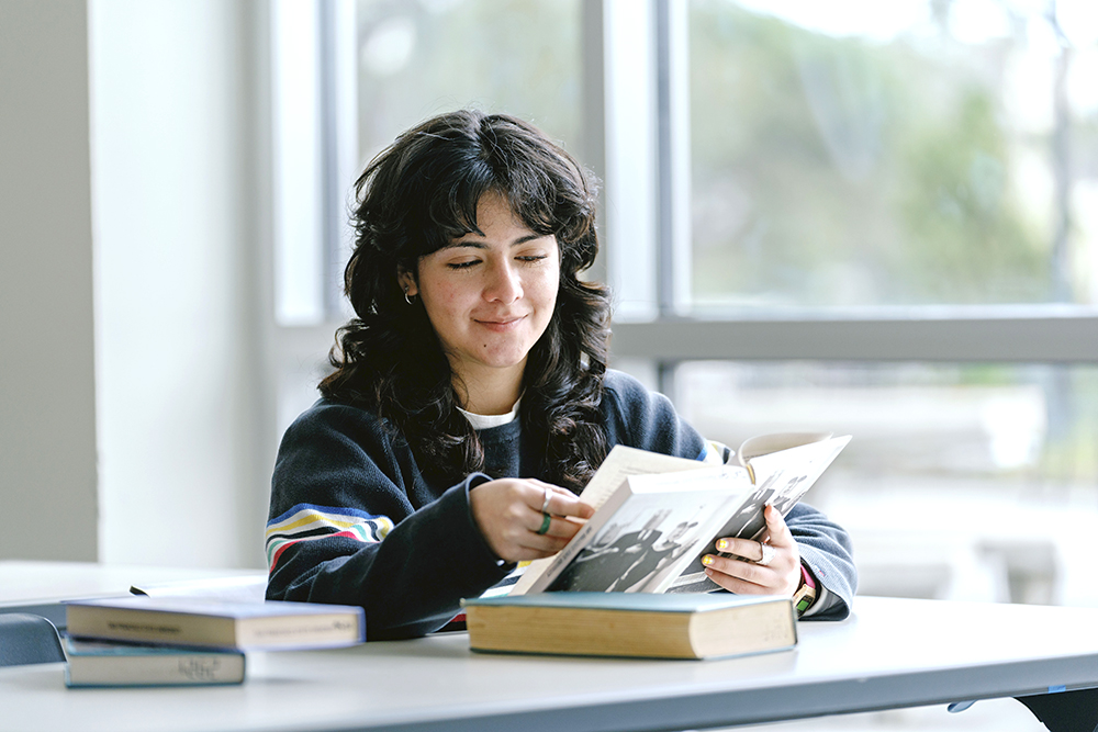 A student reading a book