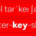 Vaja typeface shown on a red background