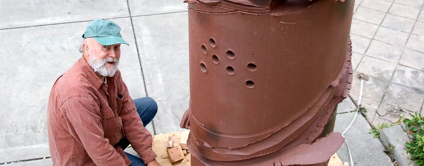 Jow Hawley sits by his in-progress sculptures