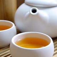 White Tea Set with tea poured