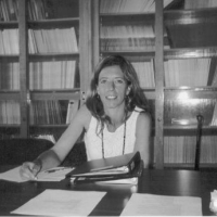 A black and white photo of Dr. Mariana Ferreira