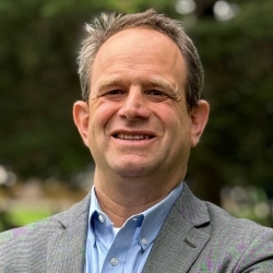 photo of Aaron Rashba in grey suit
