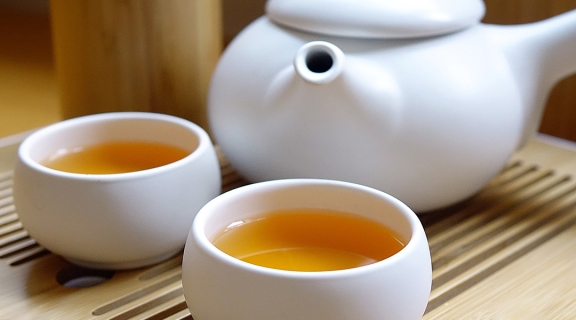 White Tea Set with tea poured