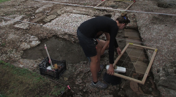 A Classics students conducts an archaeological dig for the San Francisco State Pompeii Archaeological Internship Programme.